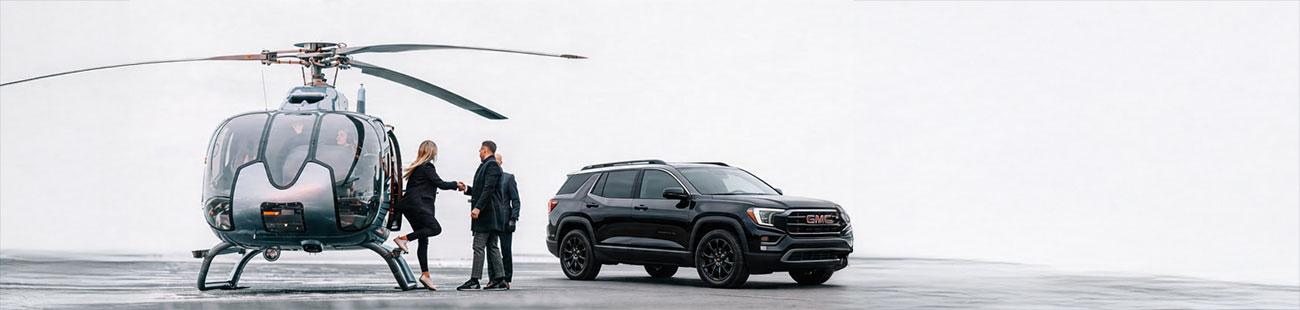 Private chauffeur service — helicopter and SUV transfer